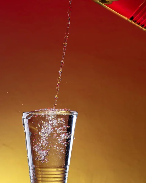 Pitcher Pouring Water Glass Sunset Background — Stock Photo, Image