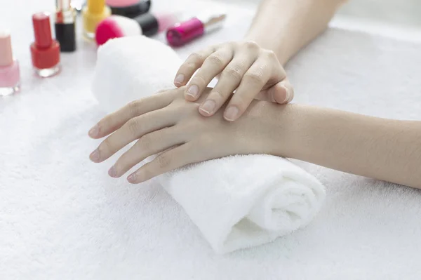 female hands at manicure salon