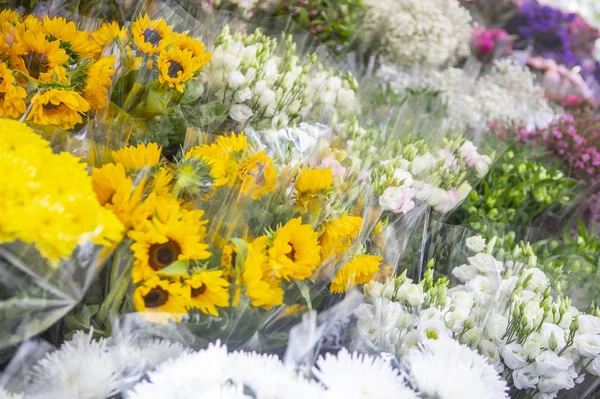 bouquets of colorful flowers for sale at the market