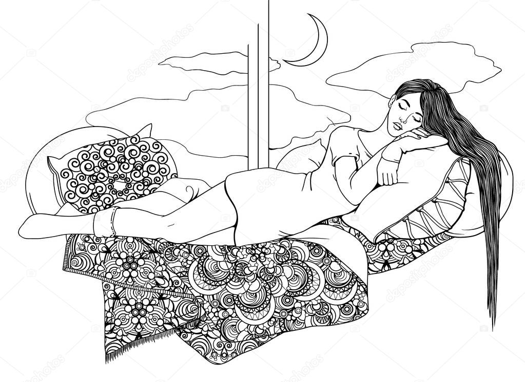 A young girl with long hair sleeps on patterned blankets and pillows