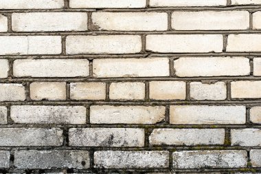 Eski, kirli, beyaz tuğladan bir duvarın arka planı. Alçı, boyalı duvarlar, doku.