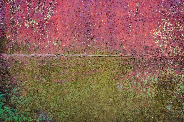 Texture of a rusty metal surface with white, green, salt, evergreen, dark blue, blue, aged cracked paint. Rusty and scratched painted metal wall