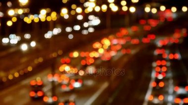 Karayolu trafik araba sürüş Bitirim, yoğun trafik ile gece Blurred.Highway, çoklu Lane Speedway adlı. Gece video arka plan, trafik çok. Yüksek hızda sürüş araba. Araba sürme, şirket, şehir veya kent fikirler büyük.