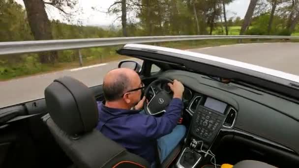 Mature Man Driving Convertible Sports Car Spring Steady Cam Shot — Stock videók