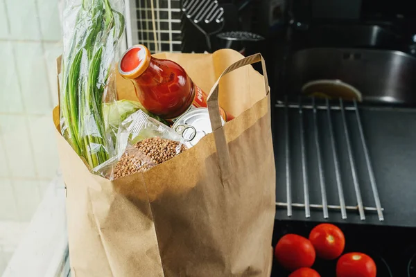craft bag with groceries on the kitchen surface