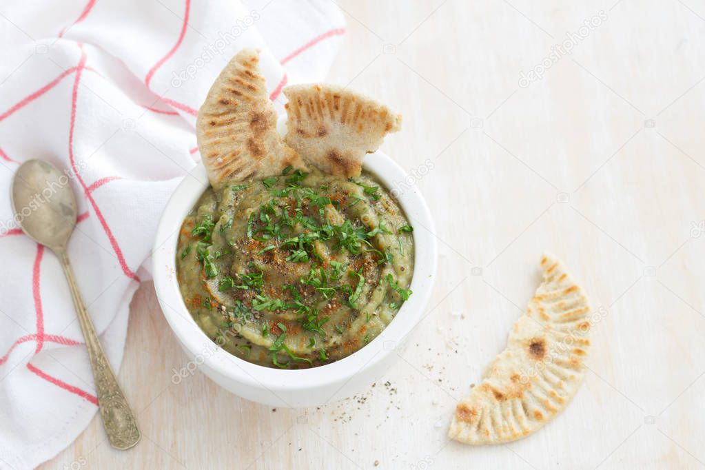 Eggplant dip with parsley and whole grain flat bread