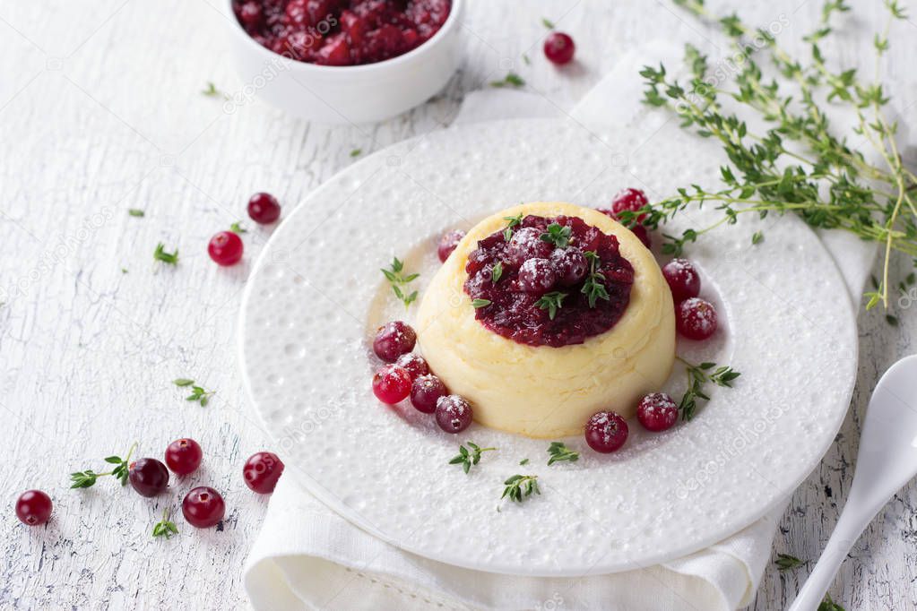 Cheesecake, cottage cheese pudding with jam and fresh cranberries