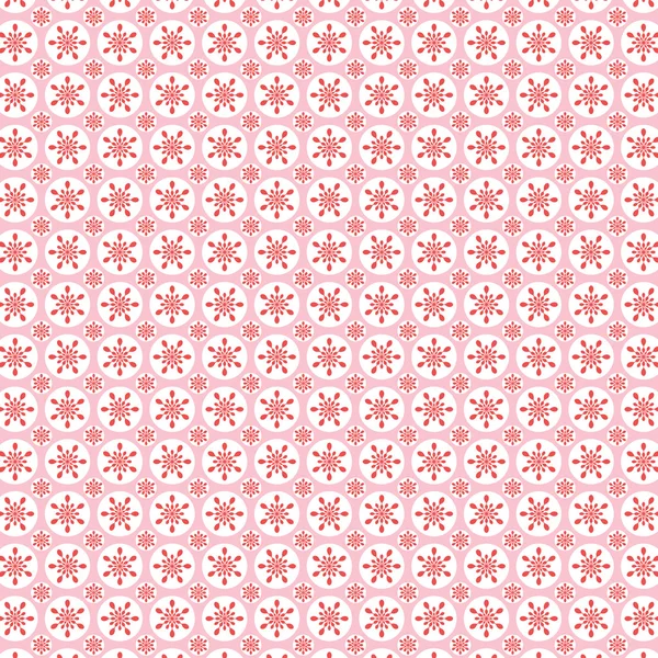 ピンクと赤の雪片の円パターン — ストックベクタ