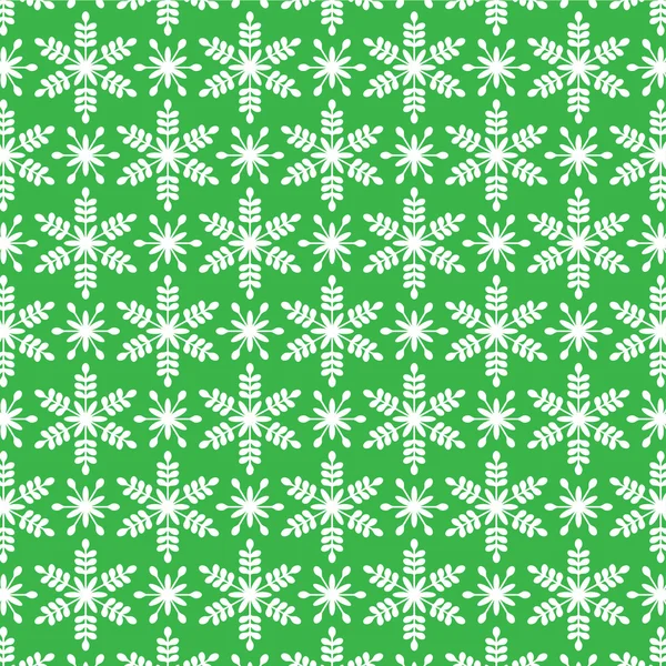 Weiße Schneeflocken auf grün — Stockvektor