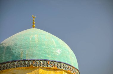 Üst altın sembolü