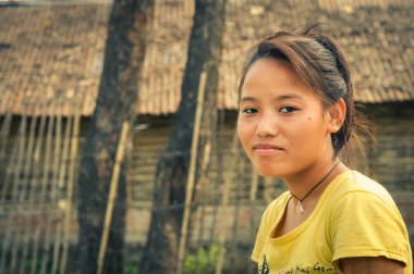 Girl in yellow in Nepal clipart