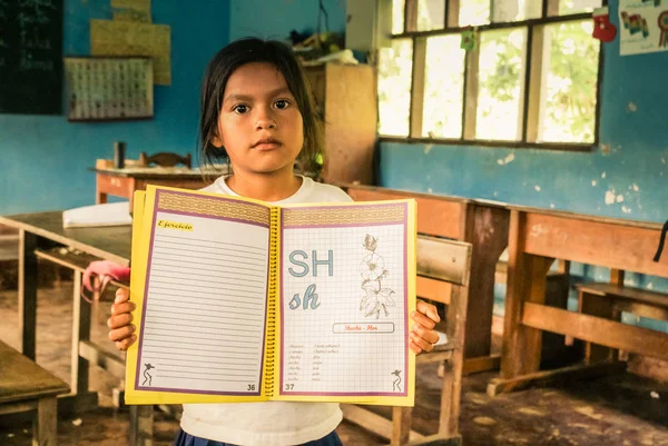 Girl with exercise book in Bolivia — Stock Photo, Image