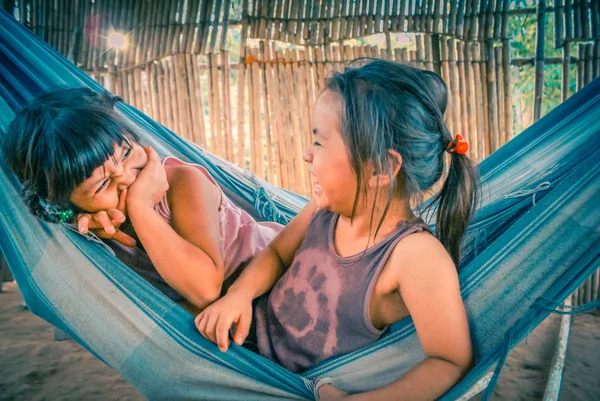 Laughing girls in hammock in Bolivia — Stock Photo, Image