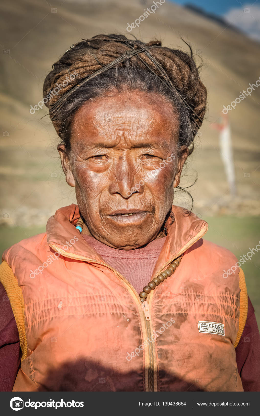 depositphotos_139438664-stock-photo-woman-with-sun-tanned-face.jpg