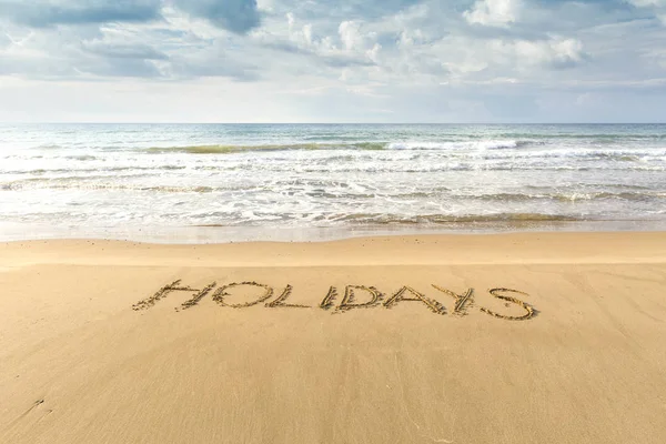 Writing in the sand. Family vacation in southern resorts. — Stock Photo, Image