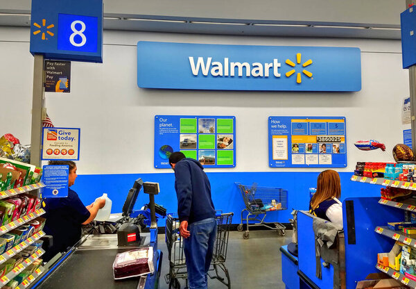 Walmart retail store, check out cash register counter customer