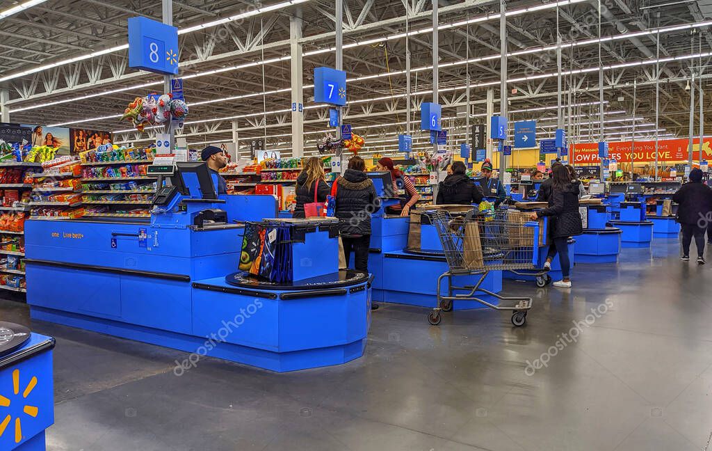Walmart customers at checkout cash register counters