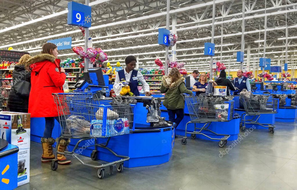 Walmart retail store paying customers, cash register counter aisles