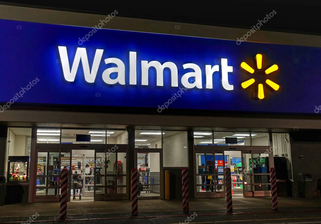 Walmart storefront entrance, late night hours