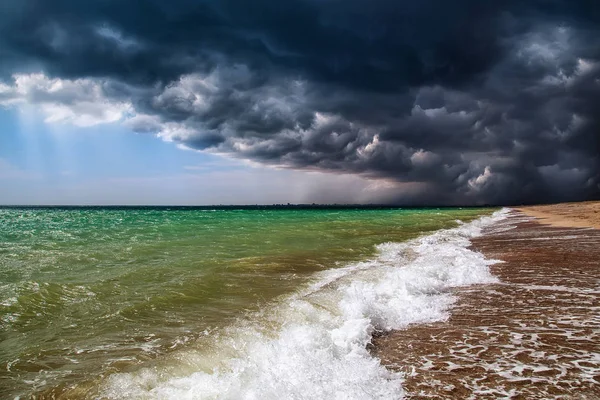 Amazing nature. The storm in the sea. The border between cloudy