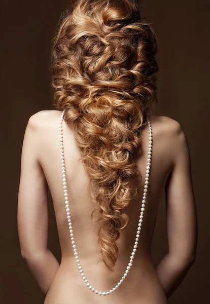 Model with long hair. Waves Curls Hairstyle. Hair Salon. Updo. F