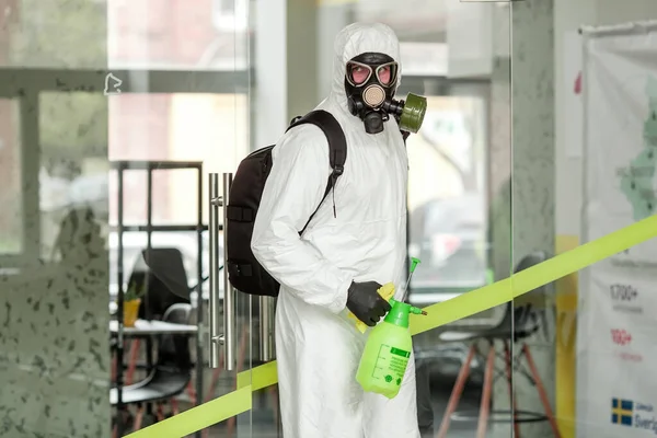 Man Protective Equipment Disinfects Sprayer Office Surface Treatment Due Coronavirus — Stock Photo, Image