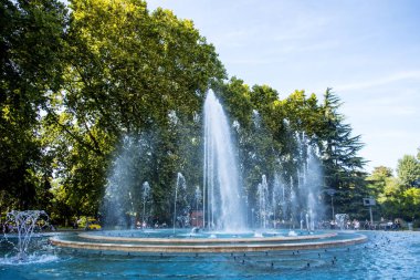 The spectacular fountains in the public park In the Danube River, between Buda and Pest, verdant Margaret Island which is a tranquil getaway within the city. Pedestrian promenades navigate around parkland ant there is an art nouveau water tower.