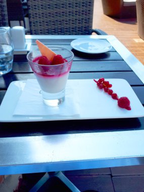 Delicious fruit ice cream in the Paris Restaurant near the Chain bridge in Budapest Hungary with a before and after shot.Budapest is filled with excellent restaurants and all are well priced