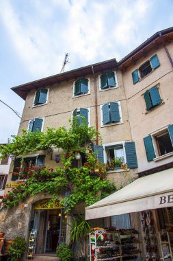 Malcesine is one of the lovely towns on Lake Garda in Northern Italy. It has its own castle guarding the town,its harbour  and its ancient narrow streets. Malcesine is so stunning and peaceful