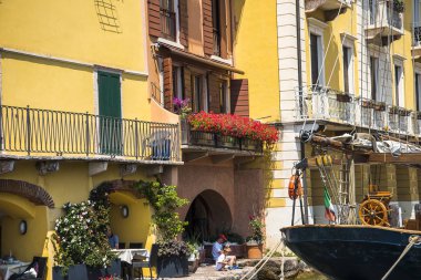 Malcesine is one of the lovely towns on Lake Garda in Northern Italy. It has its own castle guarding the town,its harbour  and its ancient narrow streets. Malcesine is so stunning and peaceful