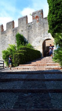 Malcesine is one of the lovely towns on Lake Garda in Northern Italy. It has its own castle guarding the town,its harbour  and its ancient narrow streets. Malcesine is so stunning and peaceful