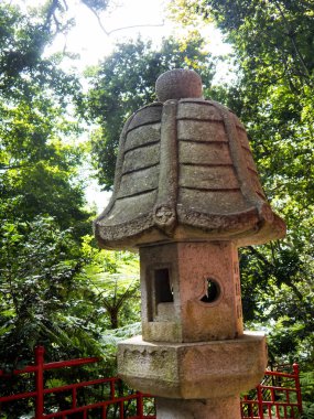 Tropical Garden at Monte above Funchal Madeira.This wonderful garden is at the top of the cablecar from the seafront in Funchal. It is filled with trees, plants and flowers. It has a lake with an impressive waterfall 