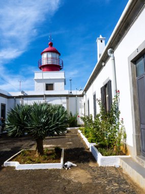 Lighthouse at Ponto de Pargo on the southern Coast of Madeira.The Ponta de Pargo Lightouse, which translates as Dolphin Point, on the south West coast of Madeira and has a small museum