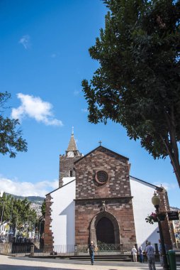 The Cathedral of our Lady of the Assumption called the Se in the Tree Lined Main Shopping Streets in Funchal Madeira Portugal. The angels are Christmas decorations