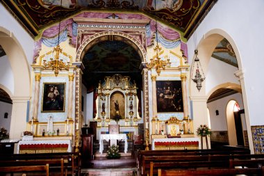 The Cathedral of our Lady of the Assumption called the Se in the Tree Lined Main Shopping Streets in Funchal Madeira Portugal. The angels are Christmas decorations