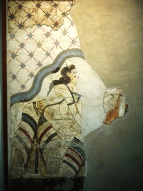 Ancient artifacts,pottery and frescoes from Thera, a city buried by the explosion of the volcano on Santorini 4000 years ago.Santorini is what remains after an enormous volcanic explosion that destroyed the Minoan culture on a formerly single island  clipart