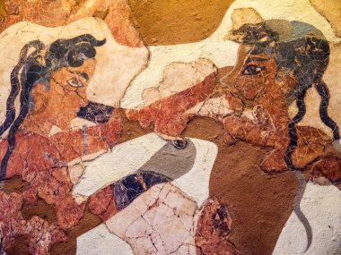 Santorini 'deki volkanın patlaması sonucu gömülü olan Thera' dan kalma antik eserler, çömlekçilik ve freskler. Santorini, eskiden tek bir ada olan Minos kültürünü yok eden devasa bir volkanik patlamadan sonra geriye kalan tek şey. 