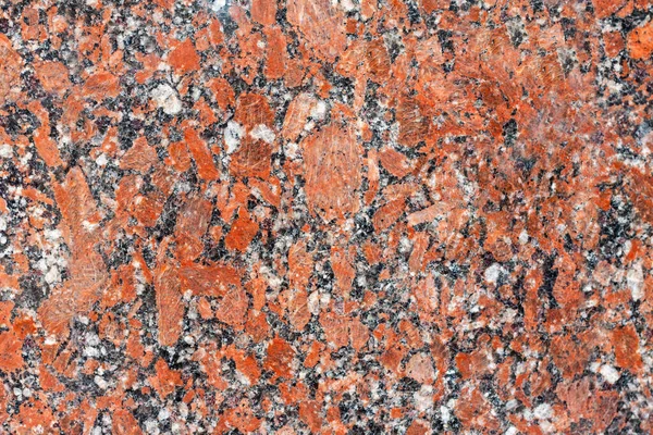 Kırmızı granit yüzey doku ya da arkaplan olarak kullanılabilir. İnşaatın döşeme dekorasyonu 