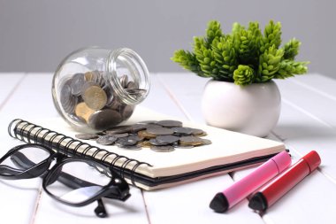 kavram kaydetme. cam kavanoza sikke