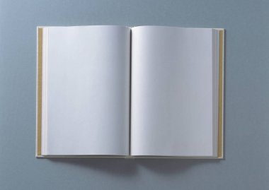 Not defteri. boş kağıt üzerinde gri renkli arka plan olarak