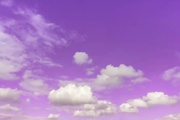 Gray and white clouds in purple shadow sky