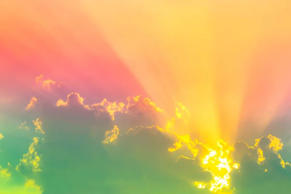 colorful fantasy sky with clouds and sun beam light