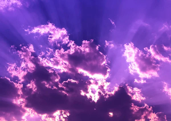 stock image Dark blue sky with violet rim light on shadow clouds