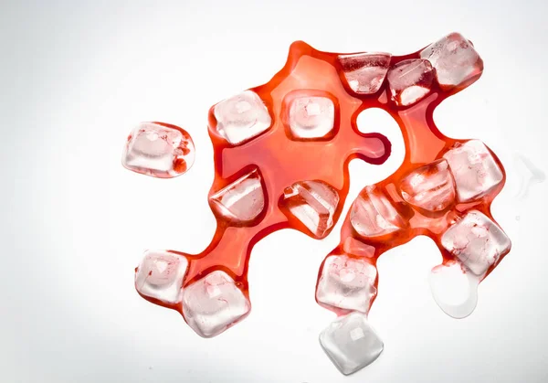 Abstract Backgrond Ice Cube Red Blood White Background Top View — Stock Photo, Image