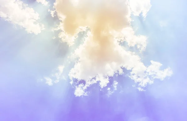 bright sunshine light with bright clouds and purple blue light