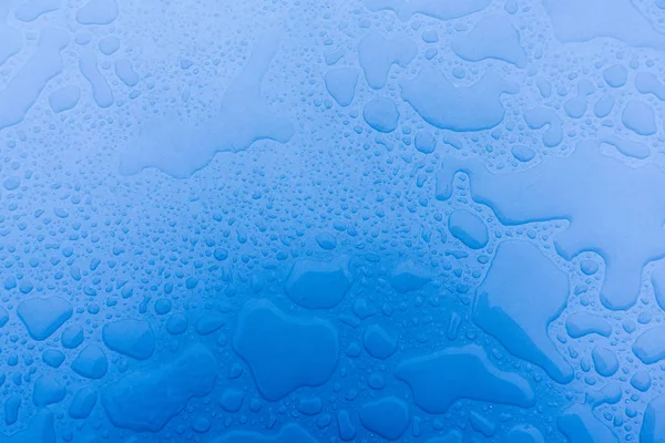 Regentropfen Auf Dem Blauen Hintergrund — Stockfoto