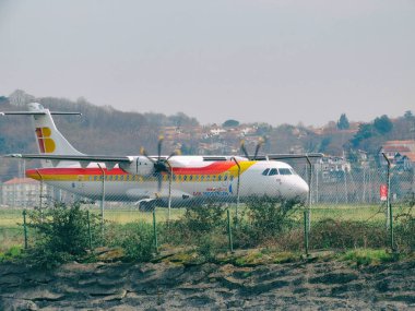 Airplane Landing At San Sebastian Airport clipart