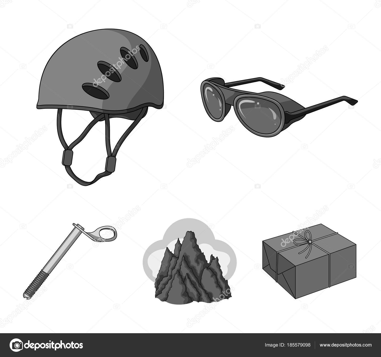 Helmet, goggles, wedge safety, peaks in the clouds.Mountaineering set