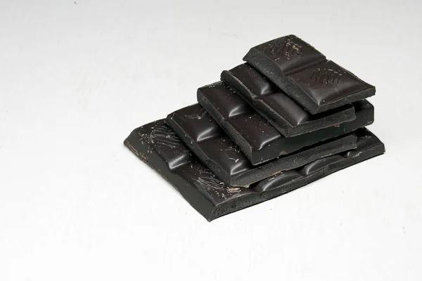 Dark chocolate on white background — Stock Photo, Image