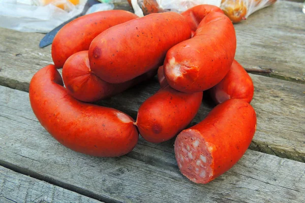 Salsicha e faca — Fotografia de Stock